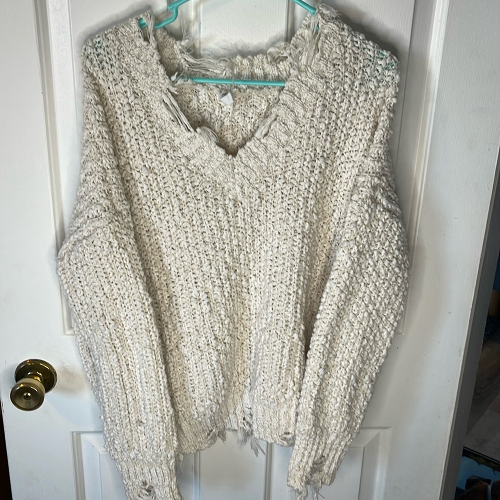Distressed sweater
